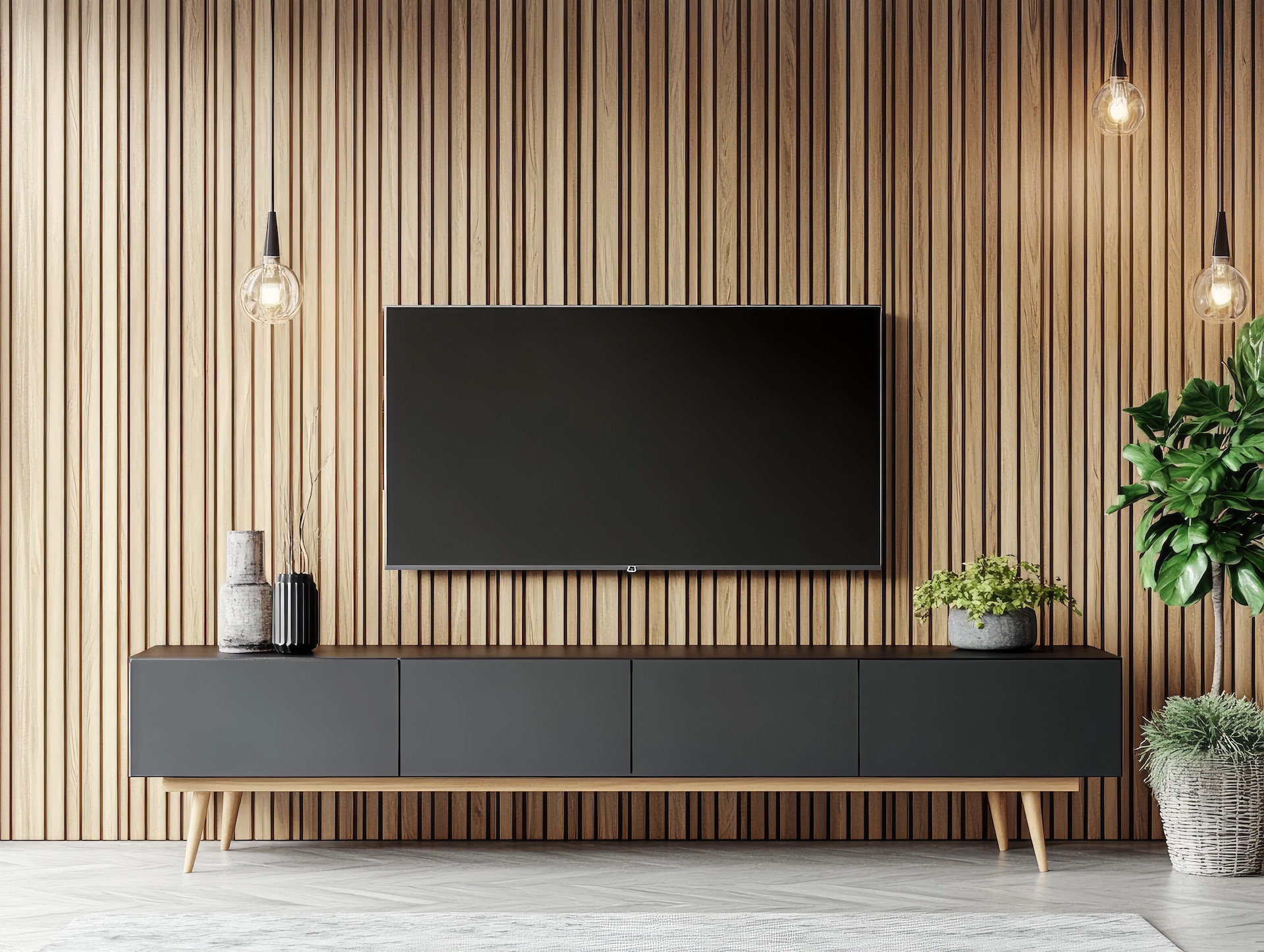 Modern living room entertainment center with a flat-screen TV mounted on a dark wood panel wall